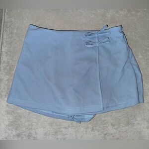 Light Blue Mini Skort with Bow Detail and Side Zip Closure